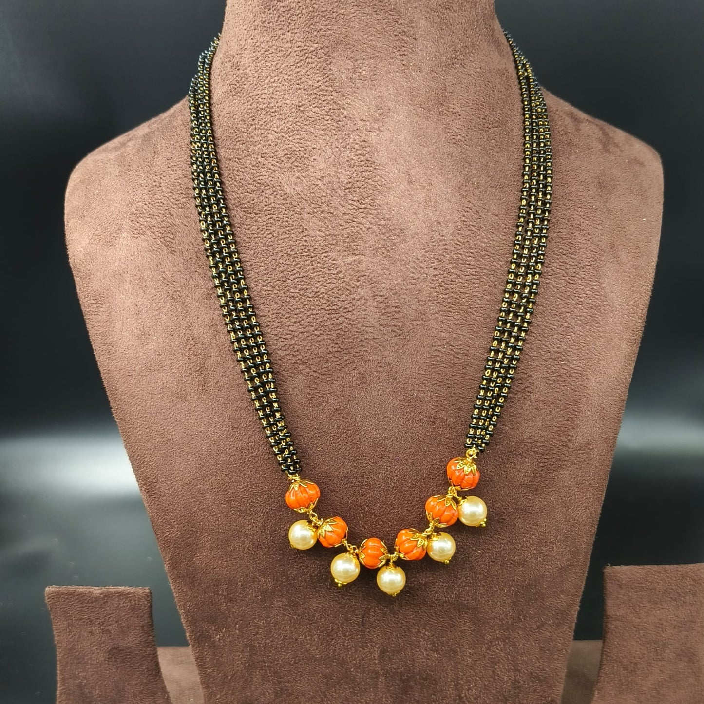 4 lines long black beads