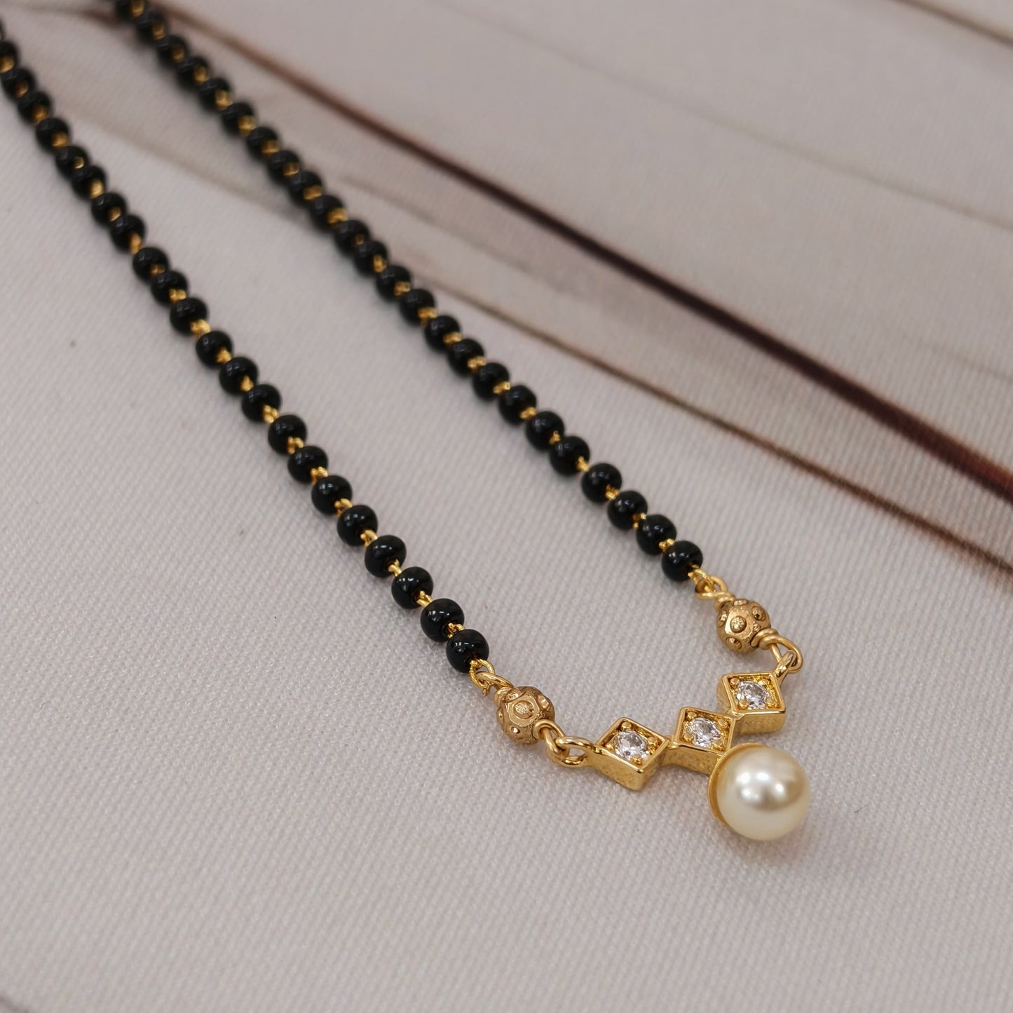 Short black beads