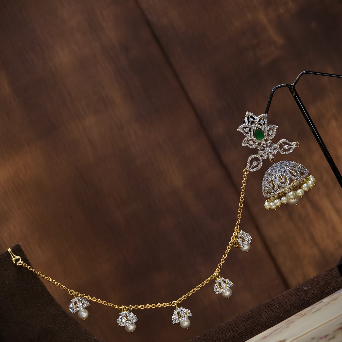 Butta earrings with Earchains.