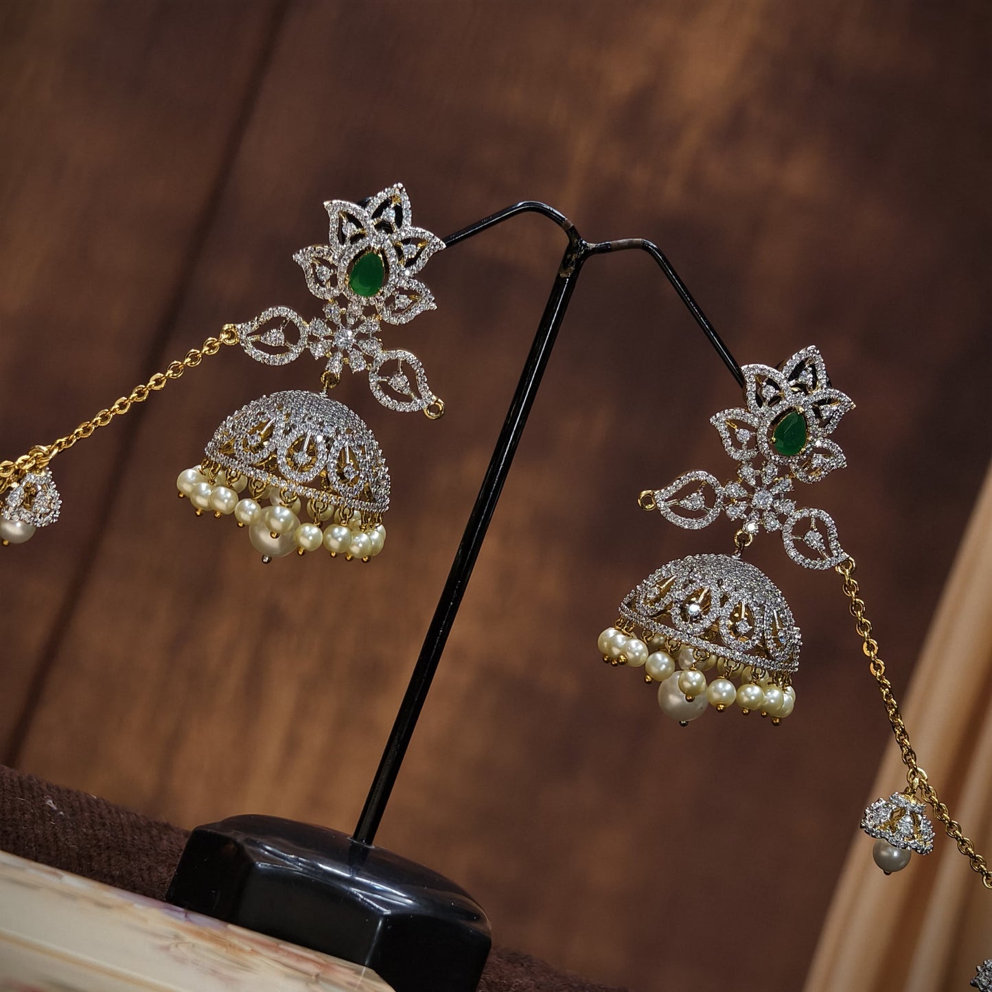 Butta earrings with Earchains.