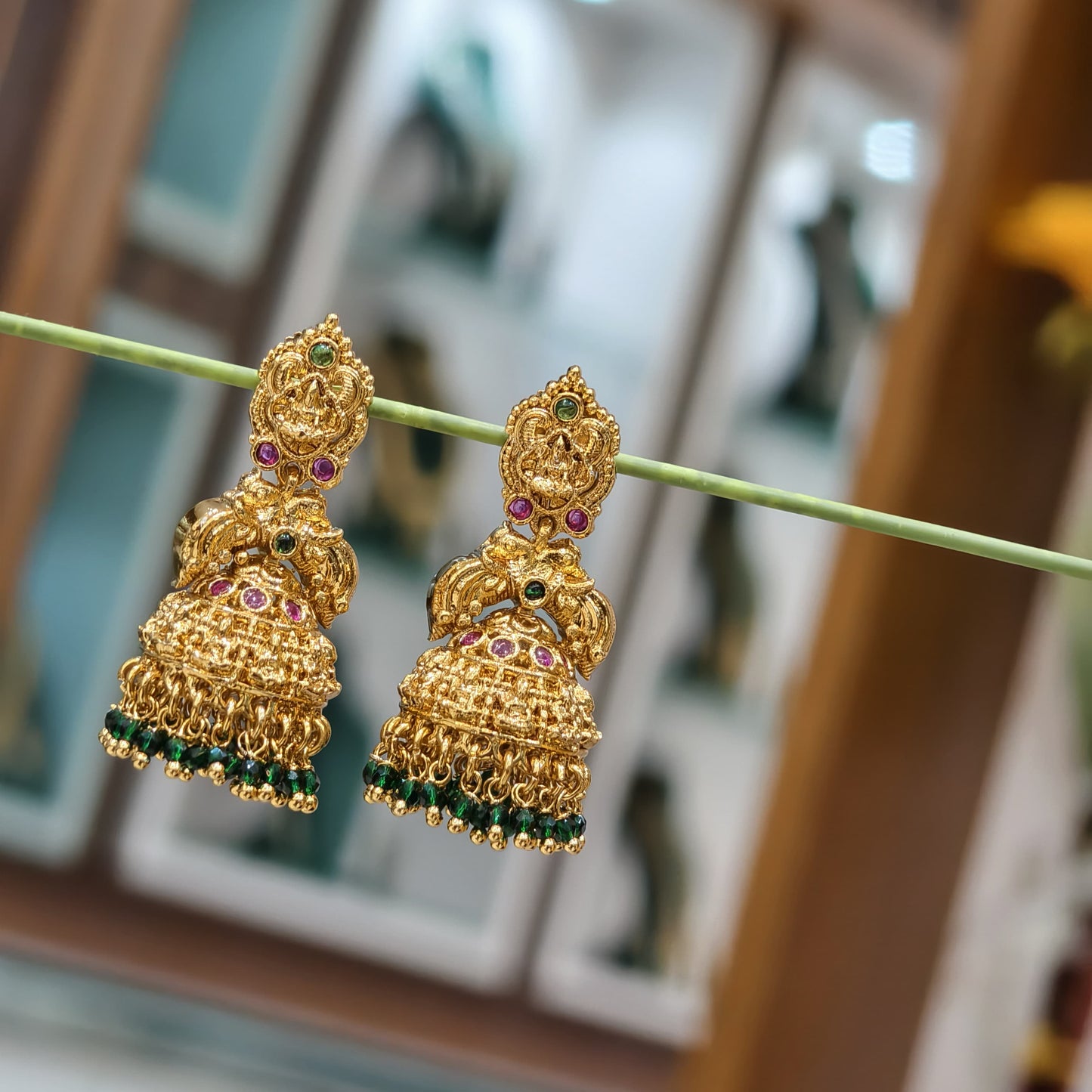 Green butta earrings