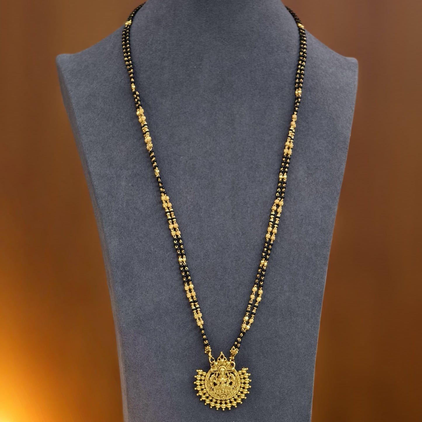 Long black beads with detachable pendant