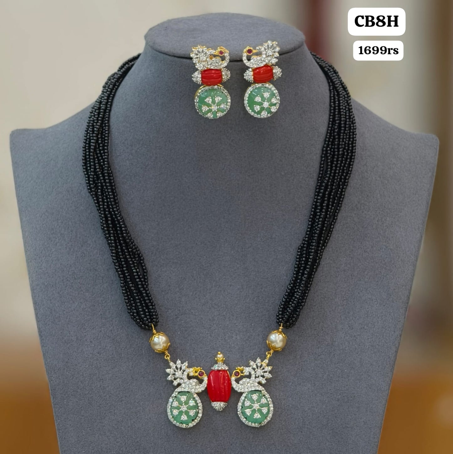 Pendent with black beads