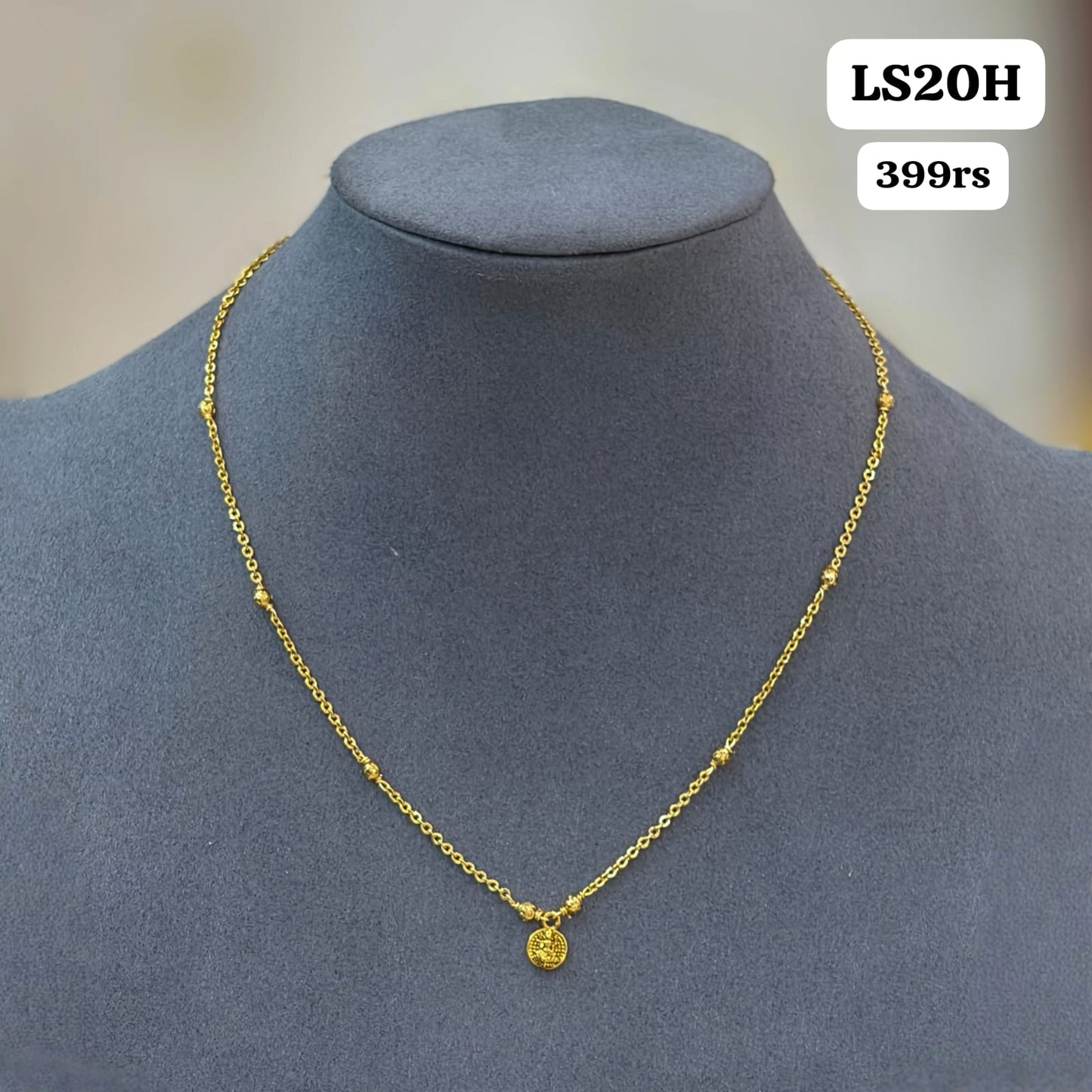Laxmi pendant short black beads