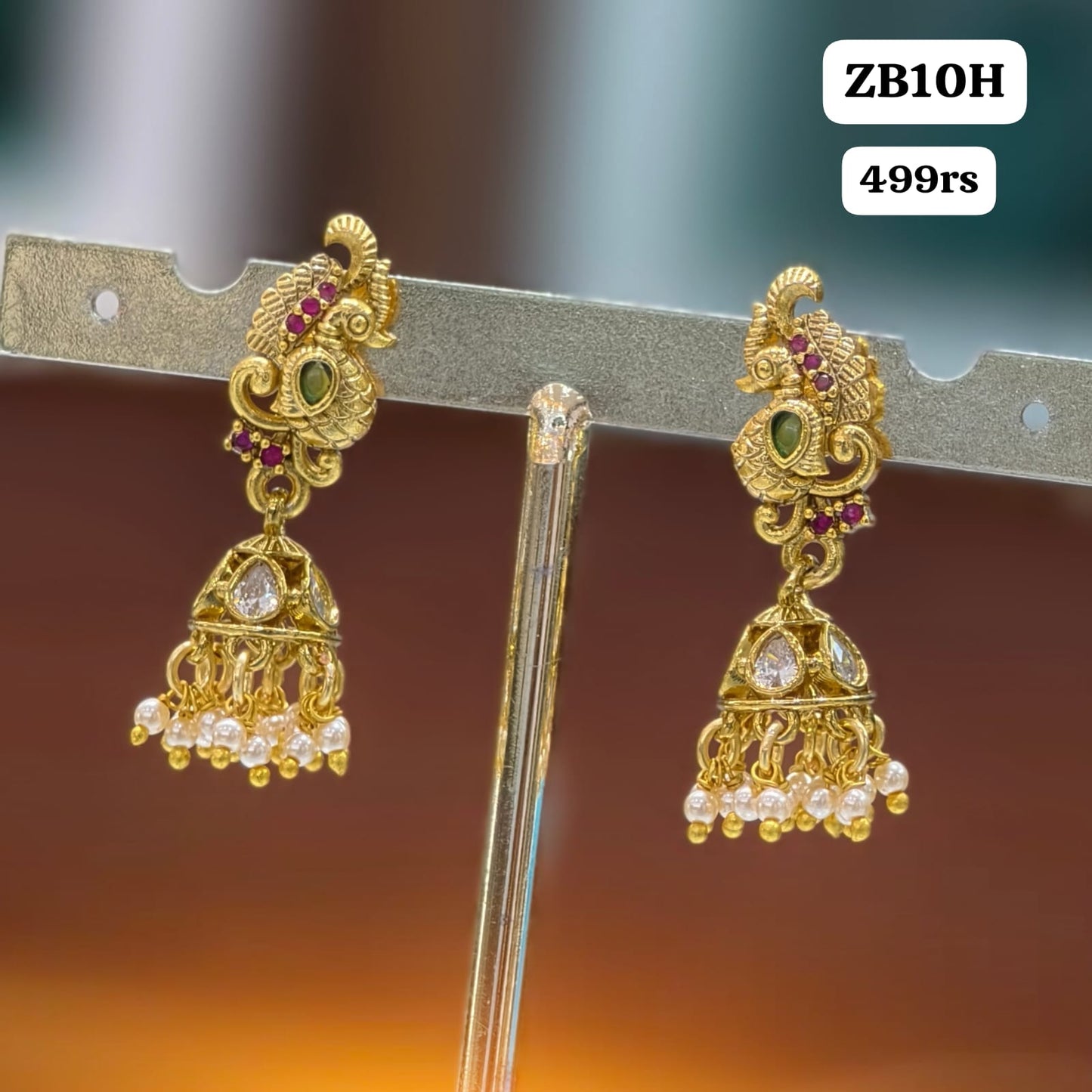 Ruby stone peacock butta earrings