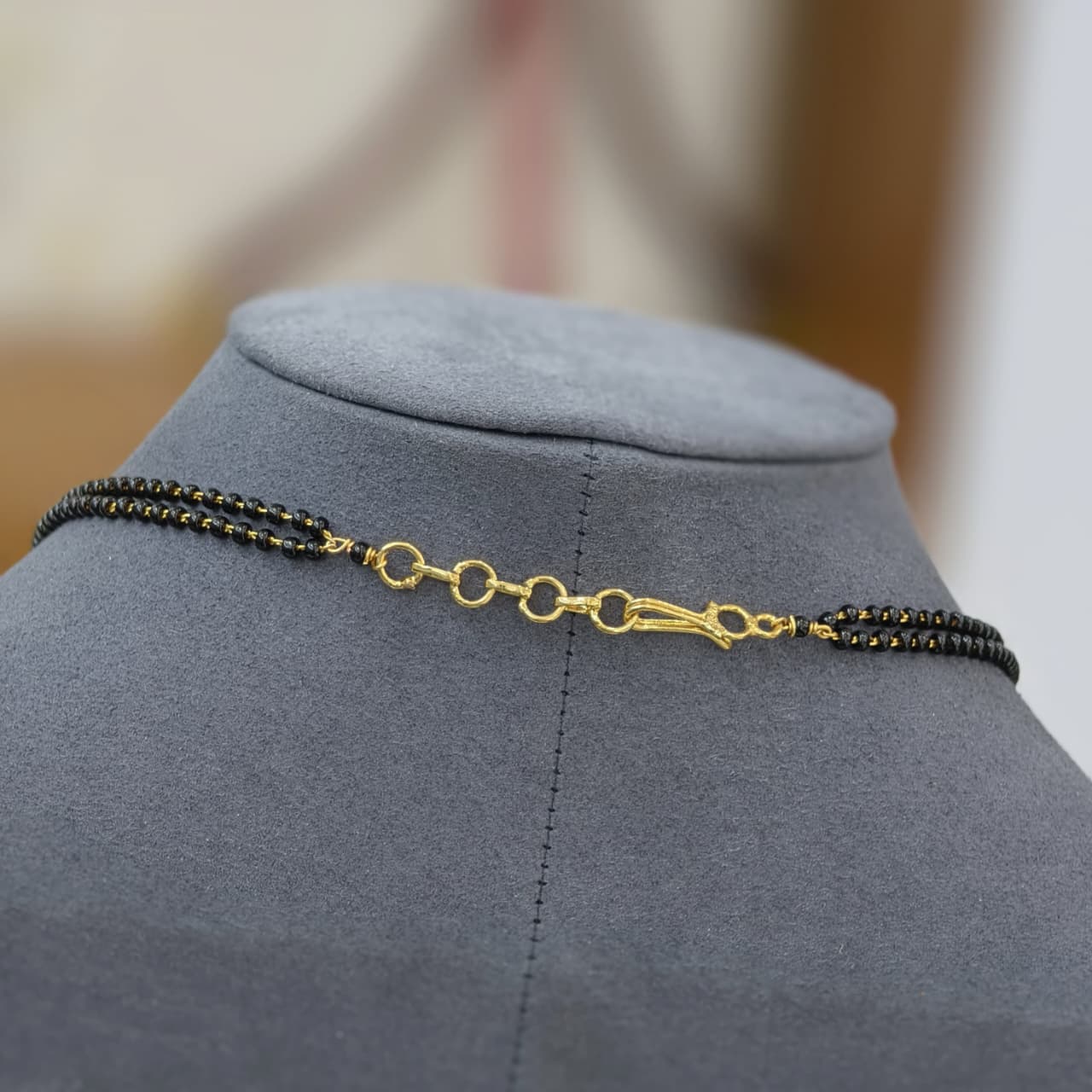 2 lines short black beads