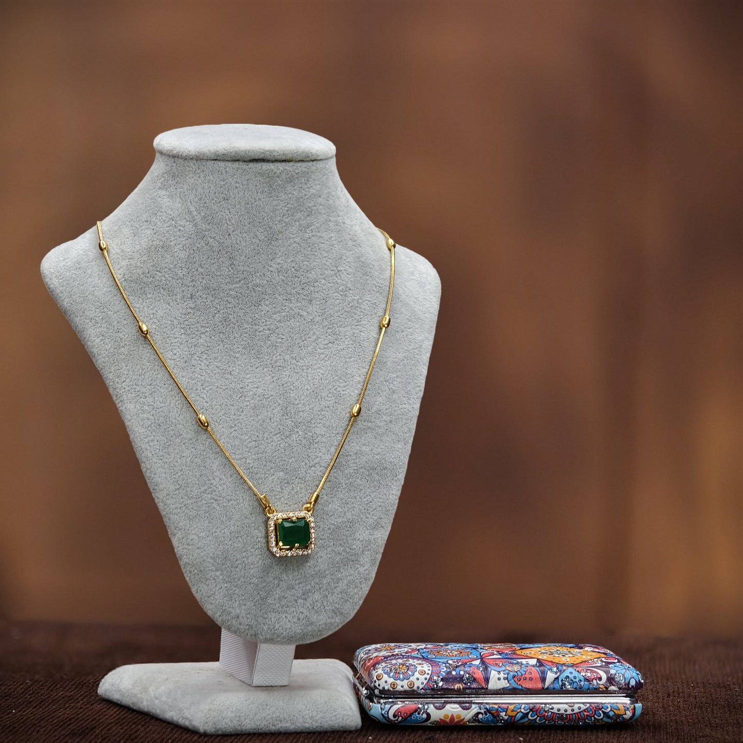 Chain with Green stone.