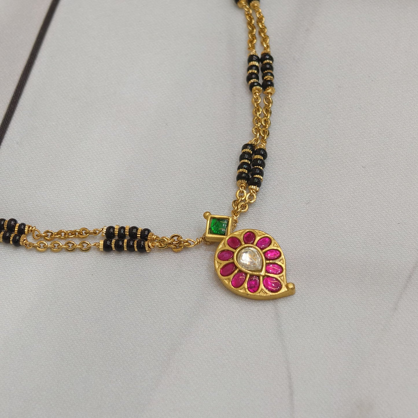 Short black beads 2 lines