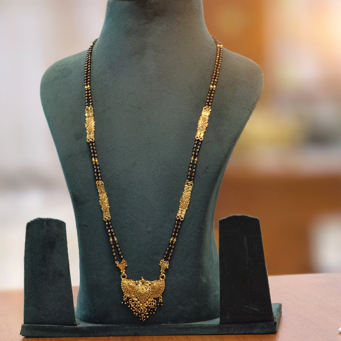 Long black beads(patti will be different, similar pattern)