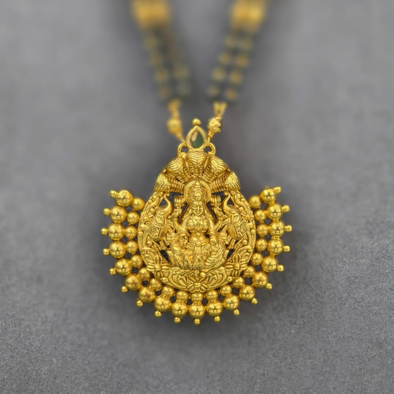 Long black beads with detachable pendant