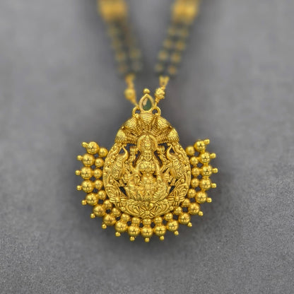 Long black beads with detachable pendant