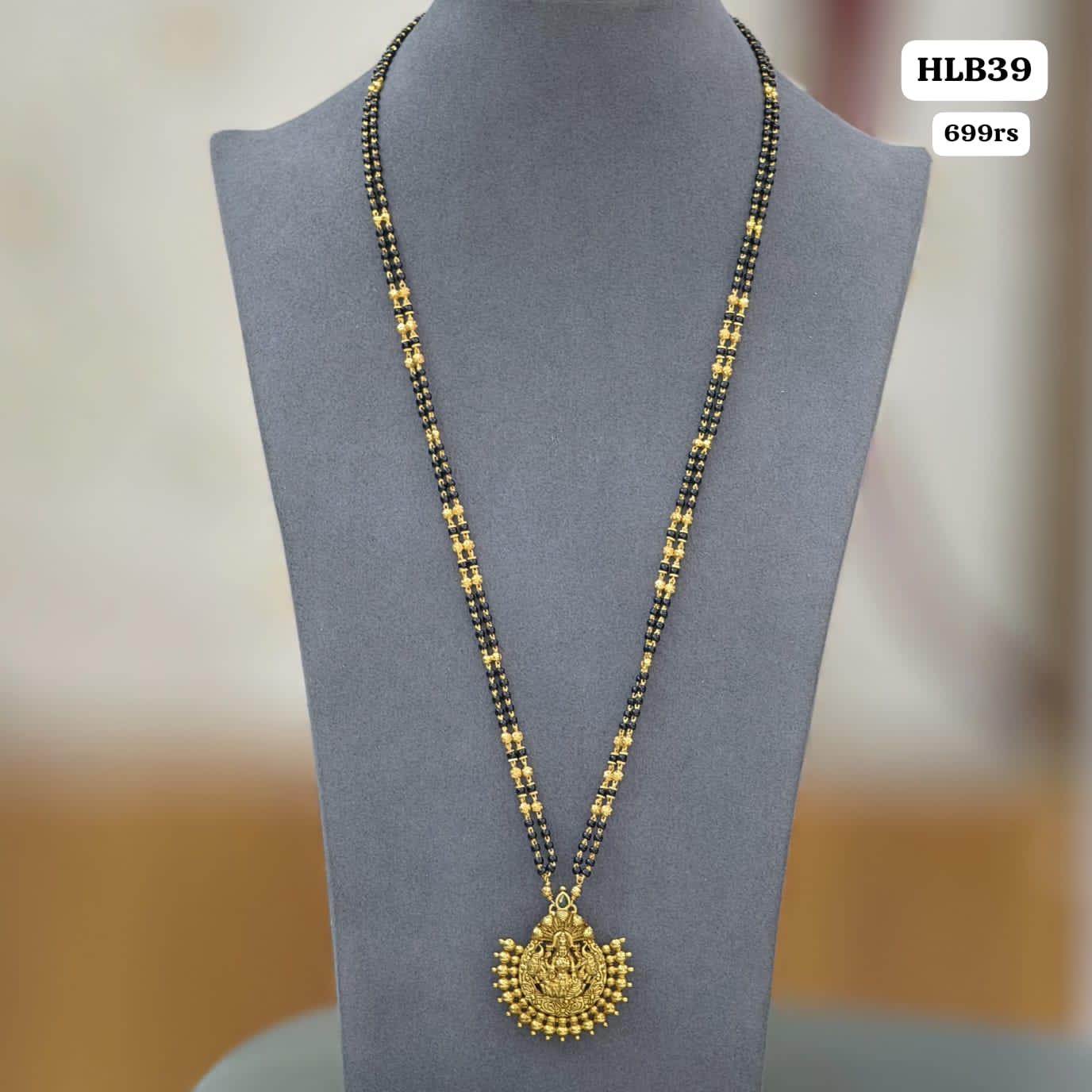 Long black beads with detachable pendant