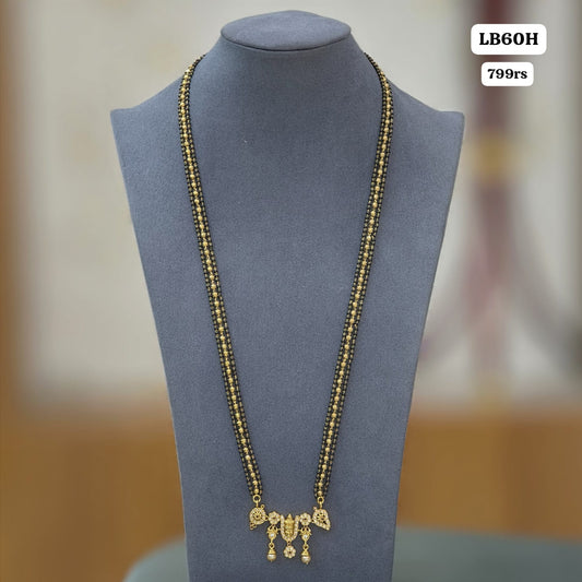 Long gold and black beads