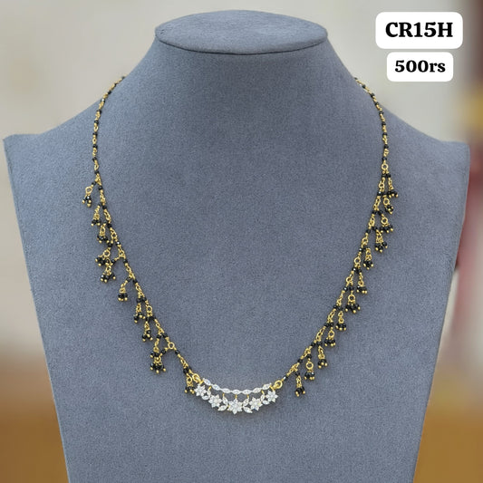 Diamond pendant with black crtyal beads