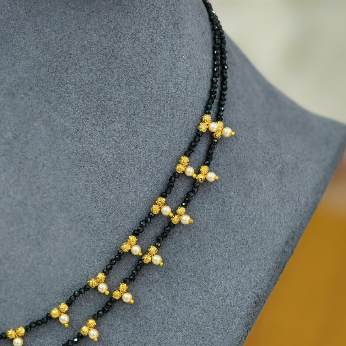 2 lines short black beads