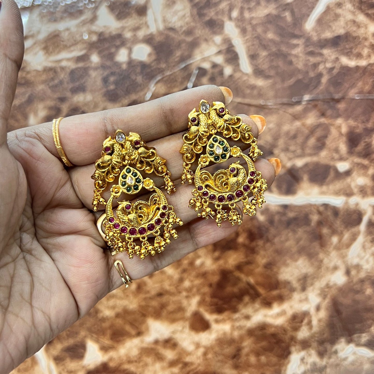 Jhumkas in Peacock Design