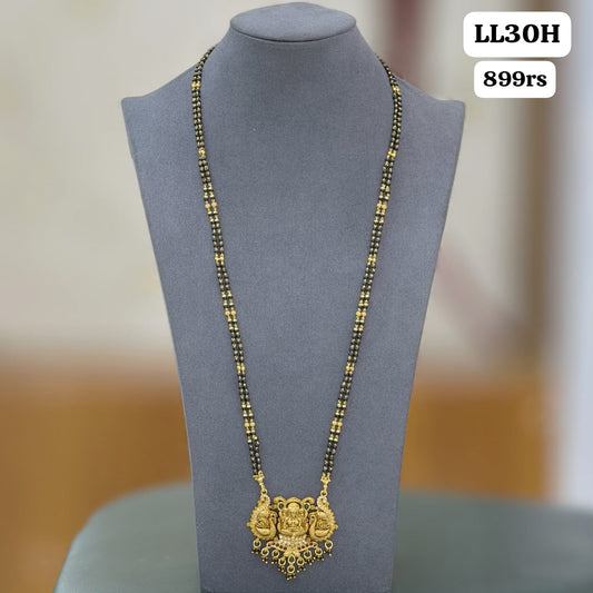 Long black beads (beads will be different )