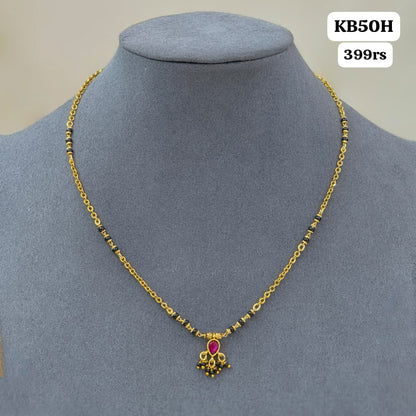 kundan pendant with short black ebads
