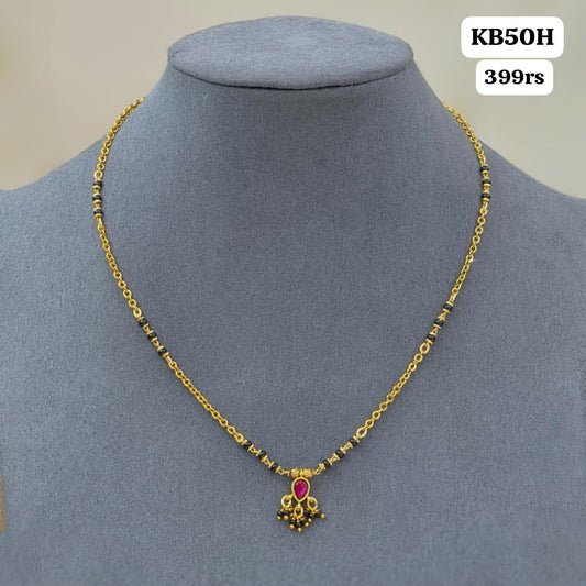 kundan pendant with short black ebads
