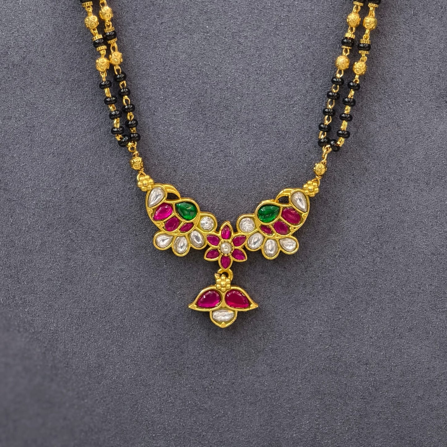 Kundan pendant with Long Black beads