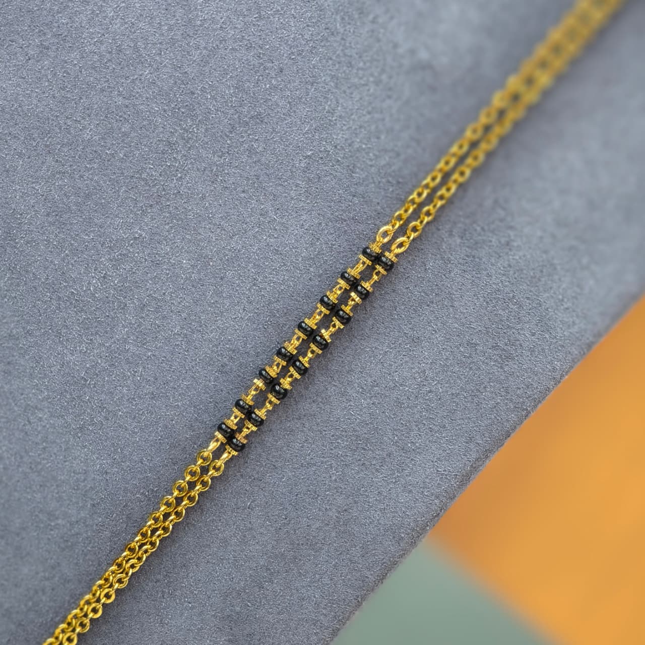 Laxmi pendant 2 lines black beads with chain