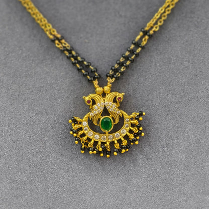 Peacock pendant with 2 lines of short black beads