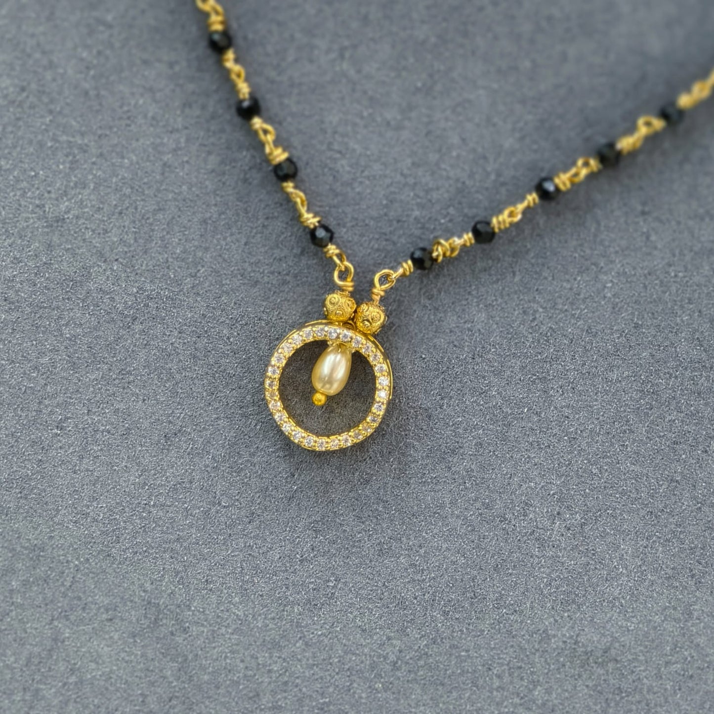 Diamond pendant with Short black beads