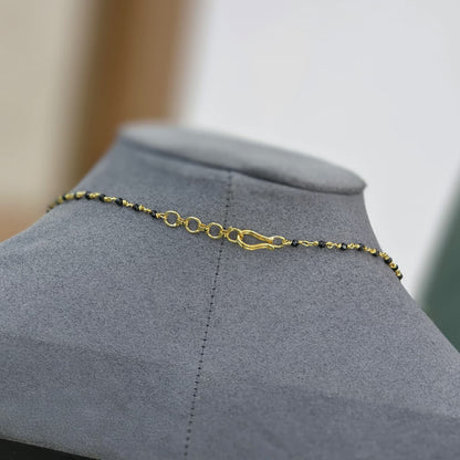 Diamond pendant with Short black beads