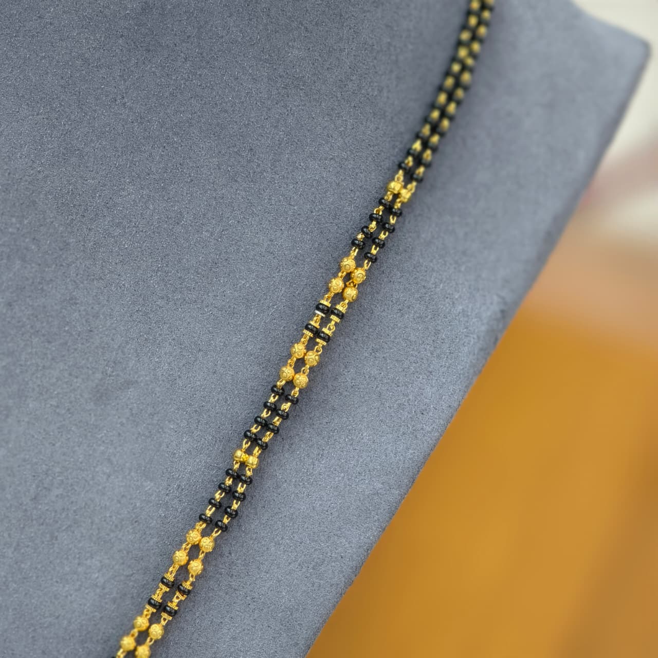 2 lines long black beads