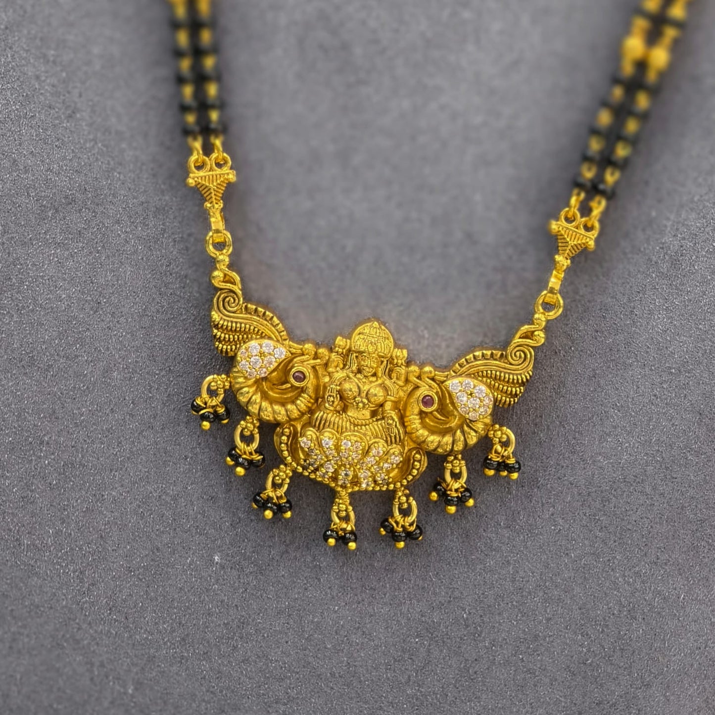 Laxmi pendant Long black beads