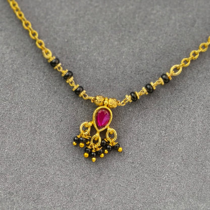 kundan pendant with short black ebads