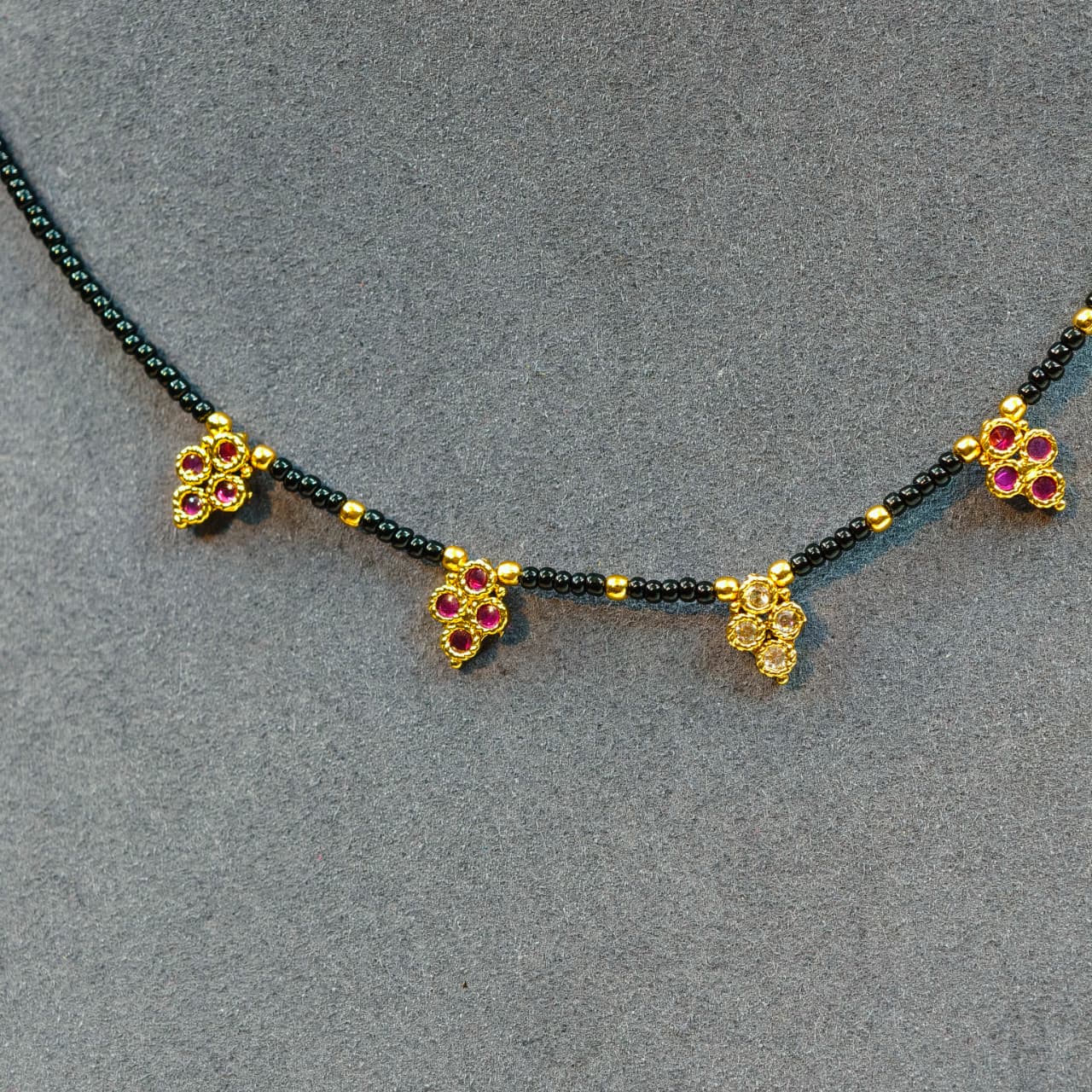 invisible short black beads